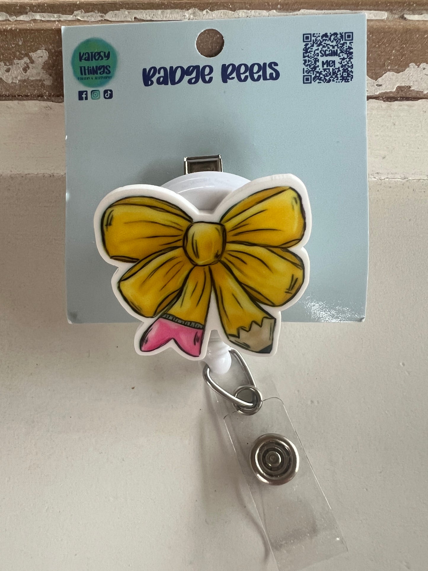 Pencil Bow Badge Reel